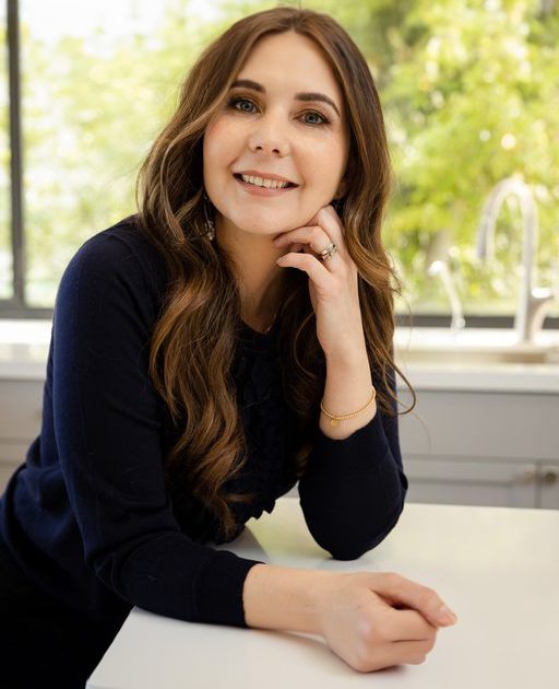 woman-sitting-on-a-kitchen-counter