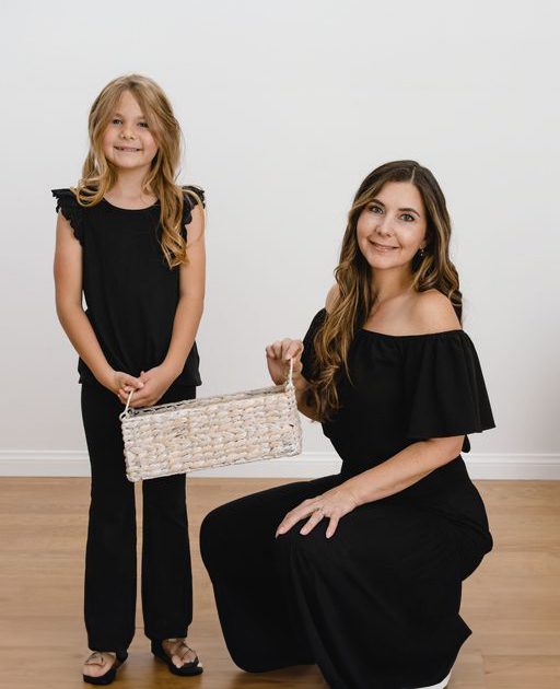 mother-and-daughter-posing-for-a-photo